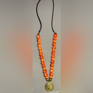 Orange/Yellow colored beaded necklace with metal pendant, ArktikCrafts, one size